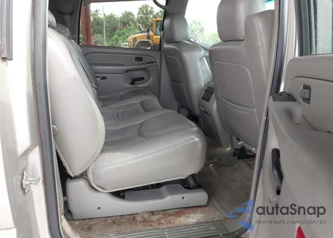 2004 Chevrolet Suburban 1500 Z71 z USA, uszkodzony, nr VIN 3GNFK16Z14G316015